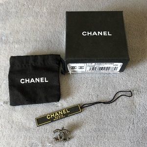 ONE Chanel black stud earring